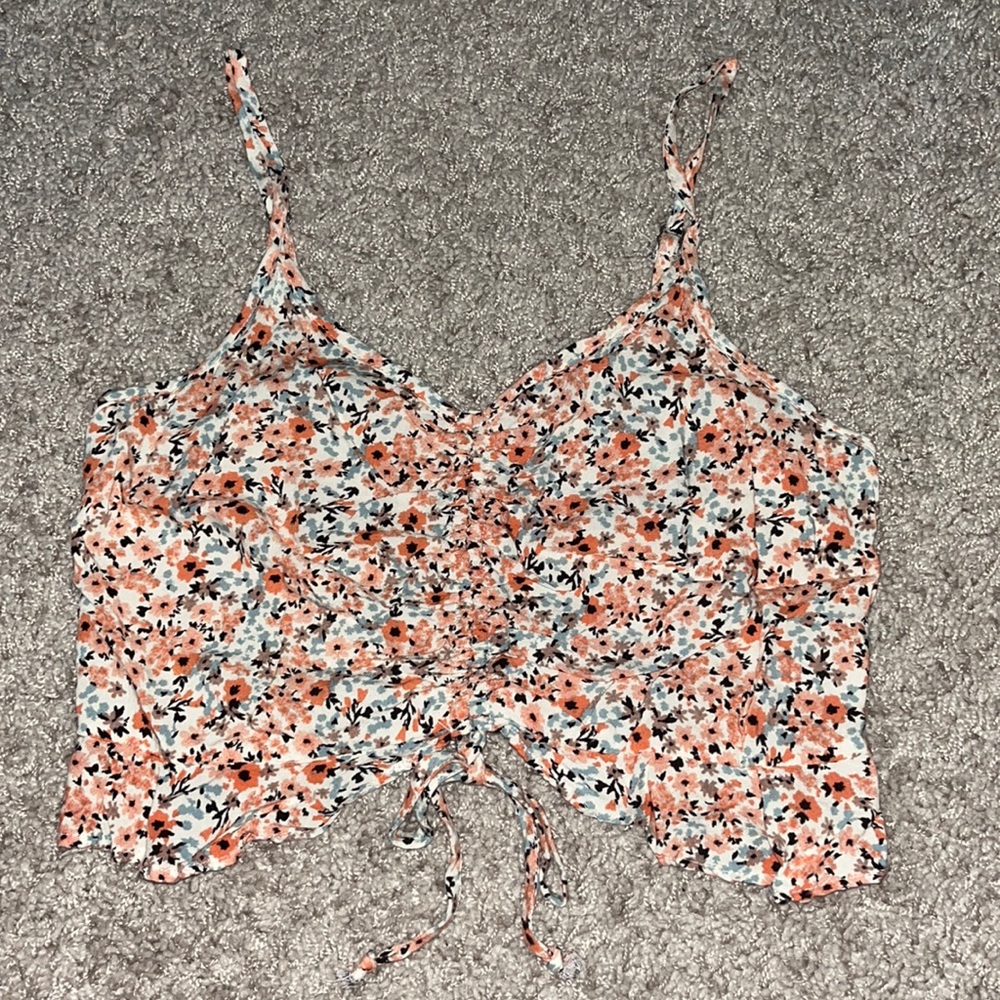 Peach and blue floral crop top.